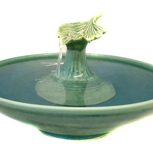 Cat water fountain with a Ginko leaf design and glazed in Vivid Green.